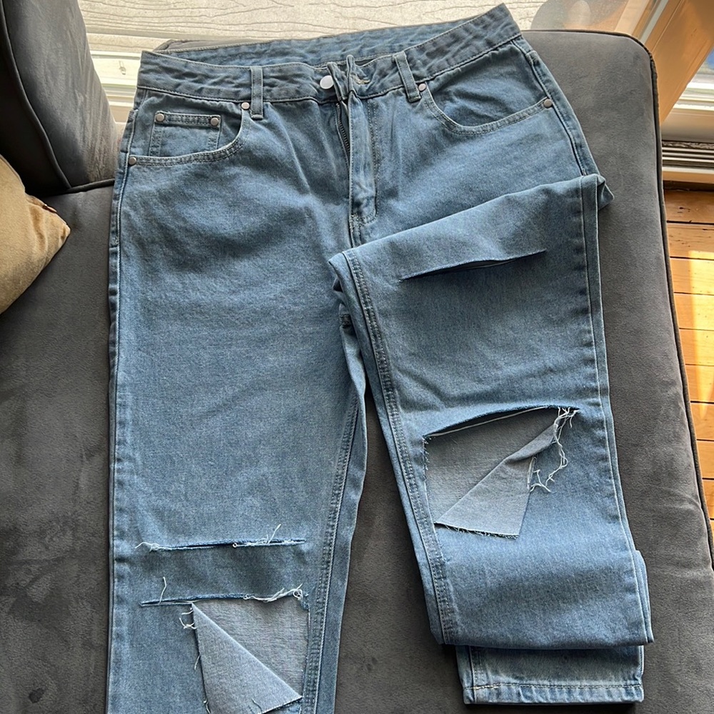 Blue Jeans with slits.